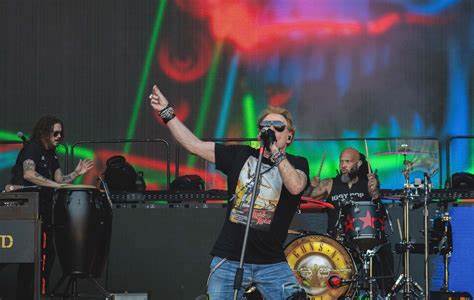 Guns N' Roses' Axl Rose Says He'll Stop 'Tossing the Mic' into Crowd After Reportedly Injuring Fan