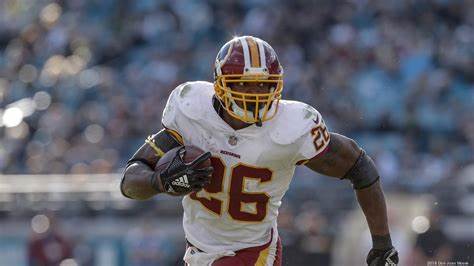 Judge orders former NFL star Adrian Peterson to turn over assets to pay $12M debt