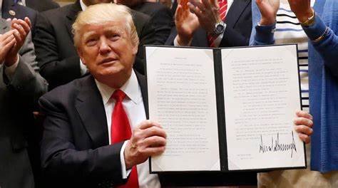 Trump signs executive order to 'turbocharge' coal mining across the US