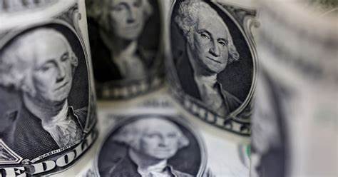US dollar skids to 3-1/2-month low, headed for biggest monthly drop in a year - Reuters.com