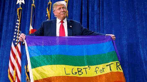 Trump signs an order to revise the Pentagon’s policy on transgender troops