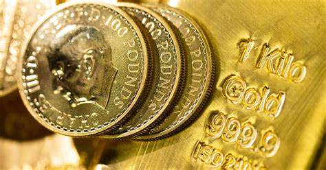 Gold Falls on Stronger Dollar as US Offers Auto Tariff Reprieve