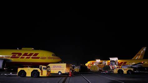 DHL resumes global shipments of packages worth over $800 to US customers