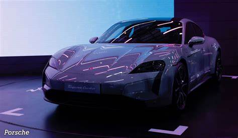Porsche Slashes Guidance as Tariff Hit Adds to Mounting Challenges