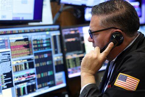 Dollar dips on weak data, yen hurt by cautious BOJ - Reuters