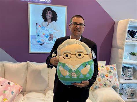 Trucker hats, squishy toys, and copious candy: Weird and wonderful finds at Warren Buffett's 'Bazaar of Bargains'