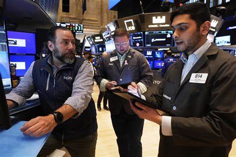 Wall Street and other markets hold steady ahead of a highly anticipated US-China meeting on trade