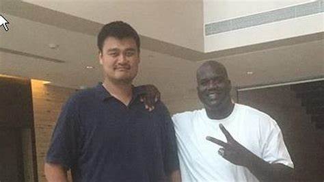 Photo Of Yao Ming Making Shaq Look Short Really Puts Yao Ming's Height In Perspective - Yahoo Finance