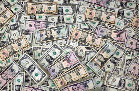 Dollar strengthens after China-US truce eases growth fears