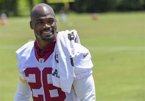 Judge orders former NFL star Adrian Peterson to turn over assets to pay $12M debt
