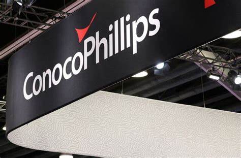 ConocoPhillips warns weak prices may trigger output cuts in oil industry