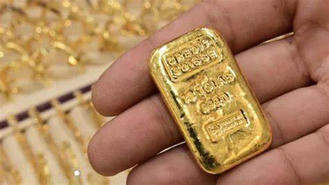 Gold Gains as Dollar Softens But It's Heading for a Weekly Loss